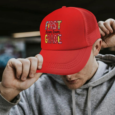 Too Cool For 1st Grade Baseball Hat For Women Vintage Red Trucker Cap With Front Artwork worn by person outdoors