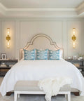 Battery Operated Wireless Wall Sconces With Remote 2 Pack Gold above bed in bright bedroom setting
