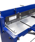 Heavy Duty Kickass Cast Iron Manual Stomp Shear Machine For Cutting Thick Sheet Metal And Aluminum Up To 14 Gauge With Razor Sharp Tool Steel Blades - top view of cutting area with metal surface.