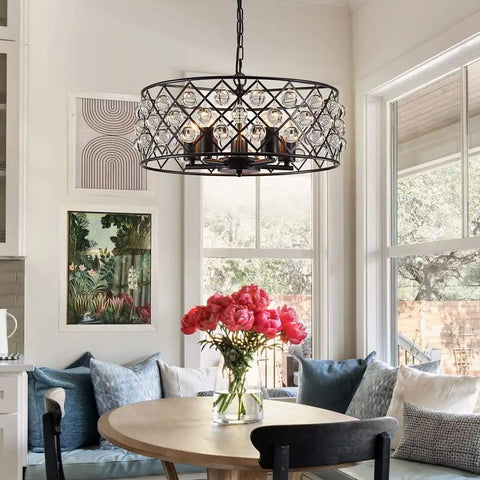 Five Light Drum Crystal Chandelier with K9 Crystals in rustic retro style above dining table in a living room.