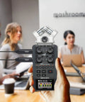 Hand holding recorder with Two Pack Lavalier Microphone With XLR Output, Omni Directional Lapel Mic, Phantom Powered CVM V02O connected