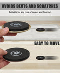 Hand holding a slider from the Round 16 Piece Furniture Moving Kit With Pro Grade Felt Pads For Carpeted And Hard Floors Easy Glide Sliders