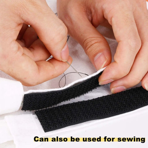 Close-up of hands sewing fabric with Adjustable 1 Inch Hook And Loop Cable Straps With 50 Metal Buckles Cut To Length Cinch Straps.