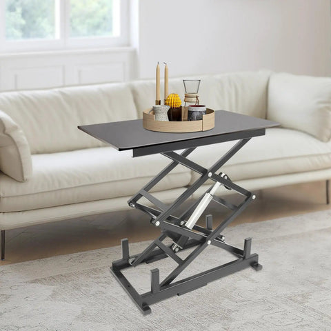Heavy Duty 24V Electric Scissor Lift Table With 180 Lbs Capacity And Remote Control Featuring Durable Iron Frame For Rugged Jobsite Lifting Tasks with a modern design, displaying lifted position in a home setting.