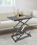 Rock Solid Electric Lift Table Rated For 180 Lbs Double Scissor Design in black finish, with decorative tray on top.