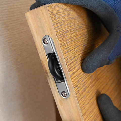 Heavy Duty Sliding Door Roller Wheels Kit With Slick Nylon Casters For Barn Glass And Closet Doors installed on wooden door.