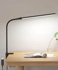Clip On Desk Lamp LED Reading Light With USB Power Dimmable 3 Color Modes And 10 Brightness Levels on wooden desk with book