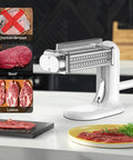 Must-Have Manual Meat Tenderizer Tool With Stainless Steel Gear on kitchen counter, suitable for beef and pork, not chicken.