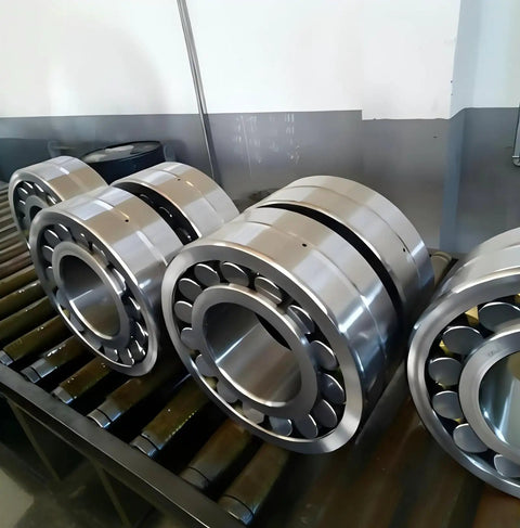 Pro Grade Spherical Roller Bearing 22207cc W33 35x72x23mm on a conveyor system for industrial use.
