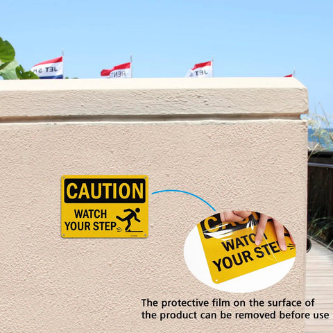 Kickass Caution Watch Your Step Signs 2 Pack 10 X 7 Inch Rust Free Reflective Aluminum Safety Plaque on wall outdoors.