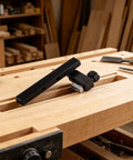 Beefy T Slot Stop Block 80 By 10 Mm With 25 Mm Slider Hand Tightening Fence Stops on a woodworking bench