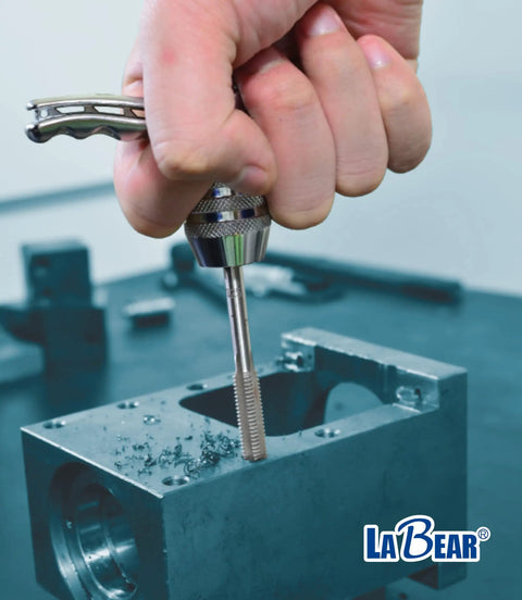 Adjustable Tap Chuck Socket Adapter in use for one quarter inch drive, pro grade tool for M3 to M8 hand taps on metal block