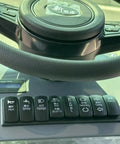 Control panel with steering wheel and buttons for Heavy Duty Commercial Ride On Industrial Sweeper For Warehouses And Factories.
