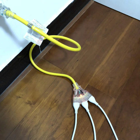 Heavy Duty Outdoor Extension Cord With Multiple Outlets, 12 Gauge 3 Prong SJTW, UL Listed, shown in indoor setting