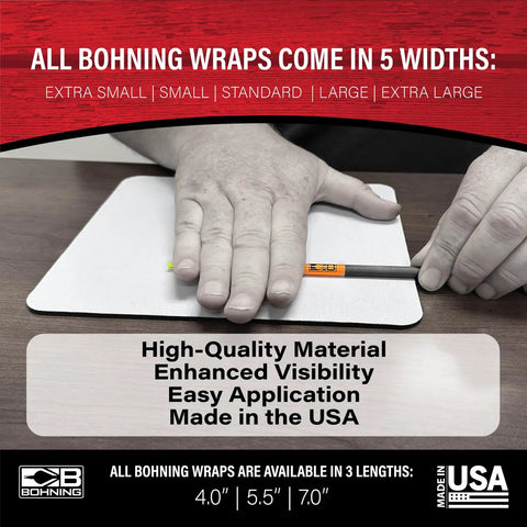 Hands applying 4 Inch Solid Arrow Wraps White X Small Self Adhesive Vinyl For Easy Application Durable Arrow Covers on table.