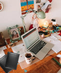 Five Pack Black Tear Resistant Bubble Pouches With Waterproof Self Adhesive Seal on a cluttered desk