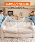 Two people covering a sofa with clear plastic drop cloths 10 pack 9x12 ft tarp for painting protect furniture floors sofas and surfaces mess free