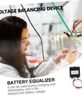 Zero Fluff 24V Heavy Duty Battery Equalizer Voltage Balancer For Nickel And Lithium Ion Packs Pro, shown in use in a lab setup.