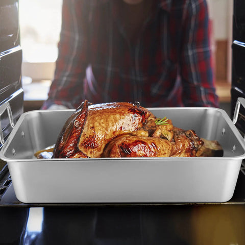 Big Turkey Roasting Pan With V Shaped Rack Stainless Steel Roaster Pan 16x11.5Inch Heavy Duty For Turkey Chicken Vegetables Lasagna Brownies Dishwasher Safe 2 Pack with a turkey in the oven