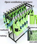 Heavy Duty Double Row Rolling Garment Rack With Twenty Bars For Life Vests And Wetsuits ventilated with bright green gear.