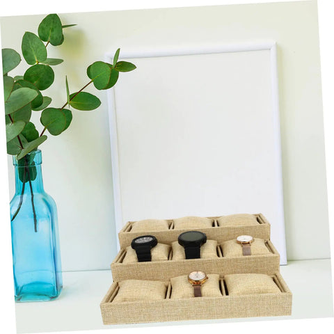 Multi Grid Watch Organizer With Deep Compartments For Desktop And Home, Classic Jewelry Display Tray With Soft Cushion Pads holding four watches.
