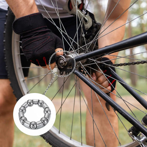 Person installing Bicycle Crank Ball Bearings Kit 3/16 Inch 5mm 7 Balls 10 Pack Replacement Bearings on a bike wheel