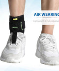 Person wearing Foot Drop Ankle Brace Orthosis With Cushioned Adjustable Wrap Compression For Easier Walking Gait Pain Relief