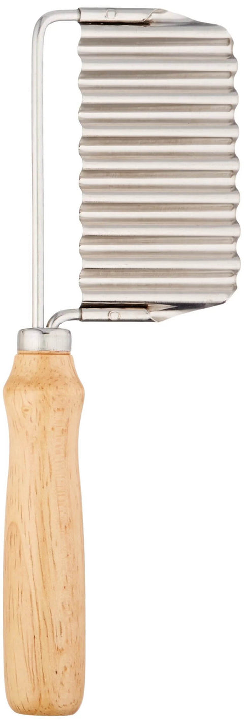 Vegetable crinkle cutter and French fry slicer with wooden handle and ribbed stainless steel blade.