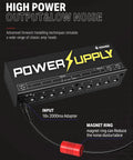 DP-1 Guitar Pedal Power Supply With 10 Isolated Outputs for 9V 12V and 18V Effects Noise Reduction Circuit Lightweight Aluminum Housing Perfect Pedalboard Hub for Studio and Live Gigs. Black aluminum power supply with 10 outputs, 18V input cable and noise-reduction ring.