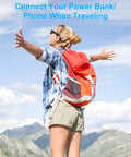 Woman with red backpack and sunglasses in mountains using 3.9Ft Type C Charging Cable For Ray Ban Meta Wayfarer Skyler Headliner Gen 2