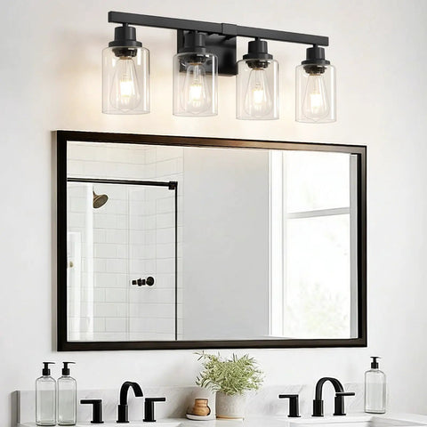 Top Shelf 4 Light Bathroom Vanity Light With Clear Glass Sleeves Matte Black Vintage Wall Sconce above mirror and sink.
