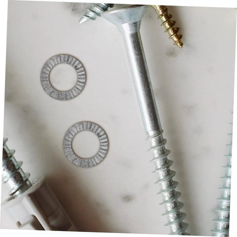 Top Shelf Tapered Lock Washers For M10 Manganese Steel 20 Pack shown with screws on a surface, highlighting grip and fit.