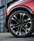 Solid 4 Pack Wheel Center Caps Black 2.36 Outer Diameter 2.2 Inner Diameter Tough ABS Plastic Rim Hub Covers Glossy Lock In Fit on red car wheel.