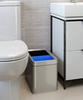 Slim Dual Compartment Trash Can And Recycle Bin With Open Top In Stainless Steel Narrow Wastebasket in bathroom setting