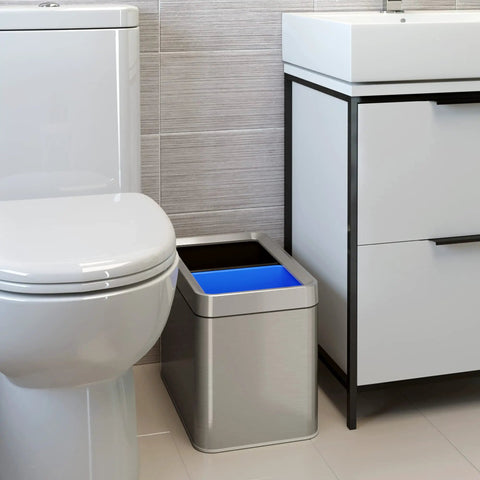 Slim Dual Compartment Trash Can And Recycle Bin With Open Top In Stainless Steel Narrow Wastebasket in bathroom setting
