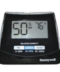 Humidity Monitor With LED Display For Humidifiers Shows Relative Humidity, black device with temperature and humidity readout