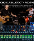 Musician setup with Bluetooth XLR Receiver For Audio Mixers PA Systems And DJ Setups connected to audio mixer.