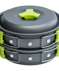Backpacking Cooking Kit 10 Piece Non Toxic Anodized Aluminum Camp Cookware Set compactly stacked with green handles