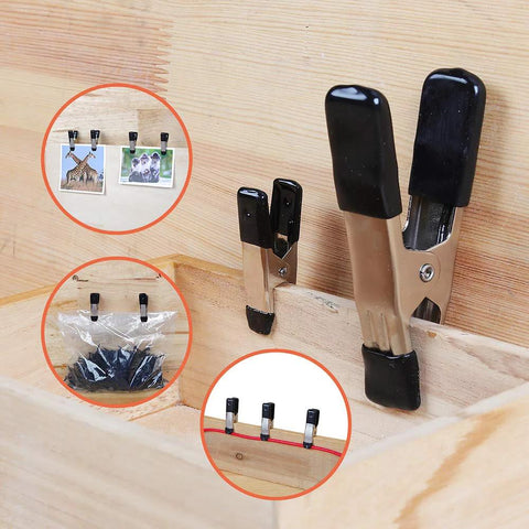 Amazon Basics 20-piece steel spring clamp set with PVC-coated tips; black and silver, includes 3/4-in and 1-in clamps.