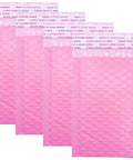 Image showing four pink 3.5 By 5.9 Inch Bubble Mailers 12 Pack Thick Poly Padded Envelopes Self Seal Opaque Shipping Bags.