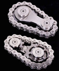 Dope Sprocket Linkage Bike Chain Fidget Spinner With Two Gears, Stainless Steel Premium Mechanic Toy For Fingers, Durable Metal Spin Toy Gray Edition With Satisfying Mechanical Chain Sound And Stress Relief. Stainless steel chain fidget toy with two gray gears on black background