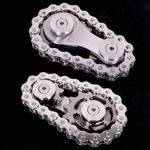 Dope Sprocket Linkage Bike Chain Fidget Spinner With Two Gears, Stainless Steel Premium Mechanic Toy For Fingers, Durable Metal Spin Toy Gray Edition With Satisfying Mechanical Chain Sound And Stress Relief. Stainless steel chain fidget toy with two gray gears on black background
