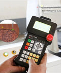 Close-up of NK105 G3 Three Axis CNC Motion Control System DSP Controller with display and buttons for detailed control in engraving.