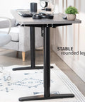VIVO Electric Standing Desk Frame Single Motor Height Adjustable Workstation Base With Memory Settings Fits 41-74 Inch Tops Strong Black Steel Legs For Home Office Ergonomic Sit Stand Setup view showing stable rounded legs and desk surface.
