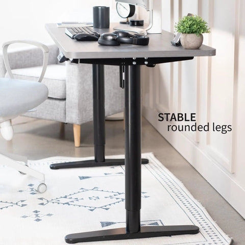 VIVO Electric Standing Desk Frame Single Motor Height Adjustable Workstation Base With Memory Settings Fits 41-74 Inch Tops Strong Black Steel Legs For Home Office Ergonomic Sit Stand Setup view showing stable rounded legs and desk surface.