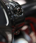 Close-up of Top Shelf Titanium Handlebar Clamp Bolts And Brake Clutch Perch Screws For Heavy Duty Motorcycles on a motorcycle