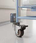 Close-up of one caster from Four Pack Replacement Wheels With Locking Brakes One And A Half Inch TPR Rubber Side Mount Casters