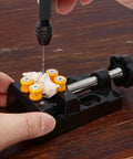 Mini Drill Press Vise Kit With 0 To 2.17 Inch Clamping Range holding shell for precise drilling on table