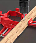 Close-up of 4 Pack Right Angle Clamps For 90 Degree Corners Picture Frame Supports with drill and wooden plank.