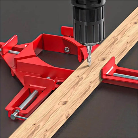 Close-up of 4 Pack Right Angle Clamps For 90 Degree Corners Picture Frame Supports with drill and wooden plank.